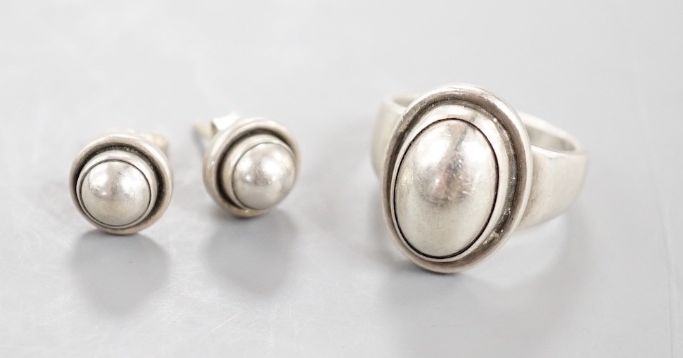 A Georg Jensen sterling 925 ring, no. 46B, size K/L and a pair of similar earrings, no.8.